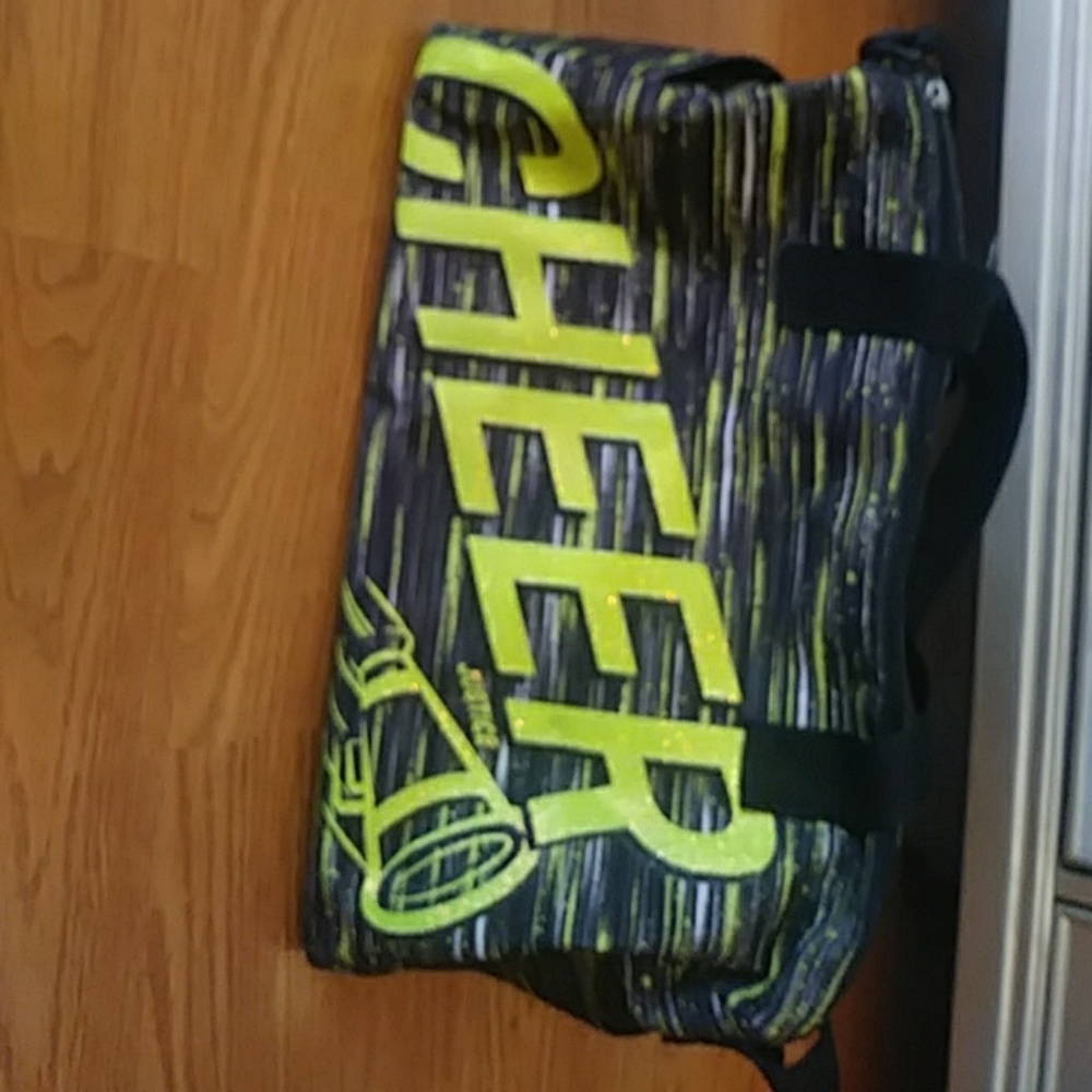 Justice cheer duffle bag in black and green